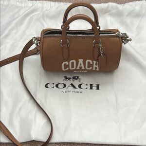 Coach Tan Mini Bag with Structured Design and Adjustable Strap